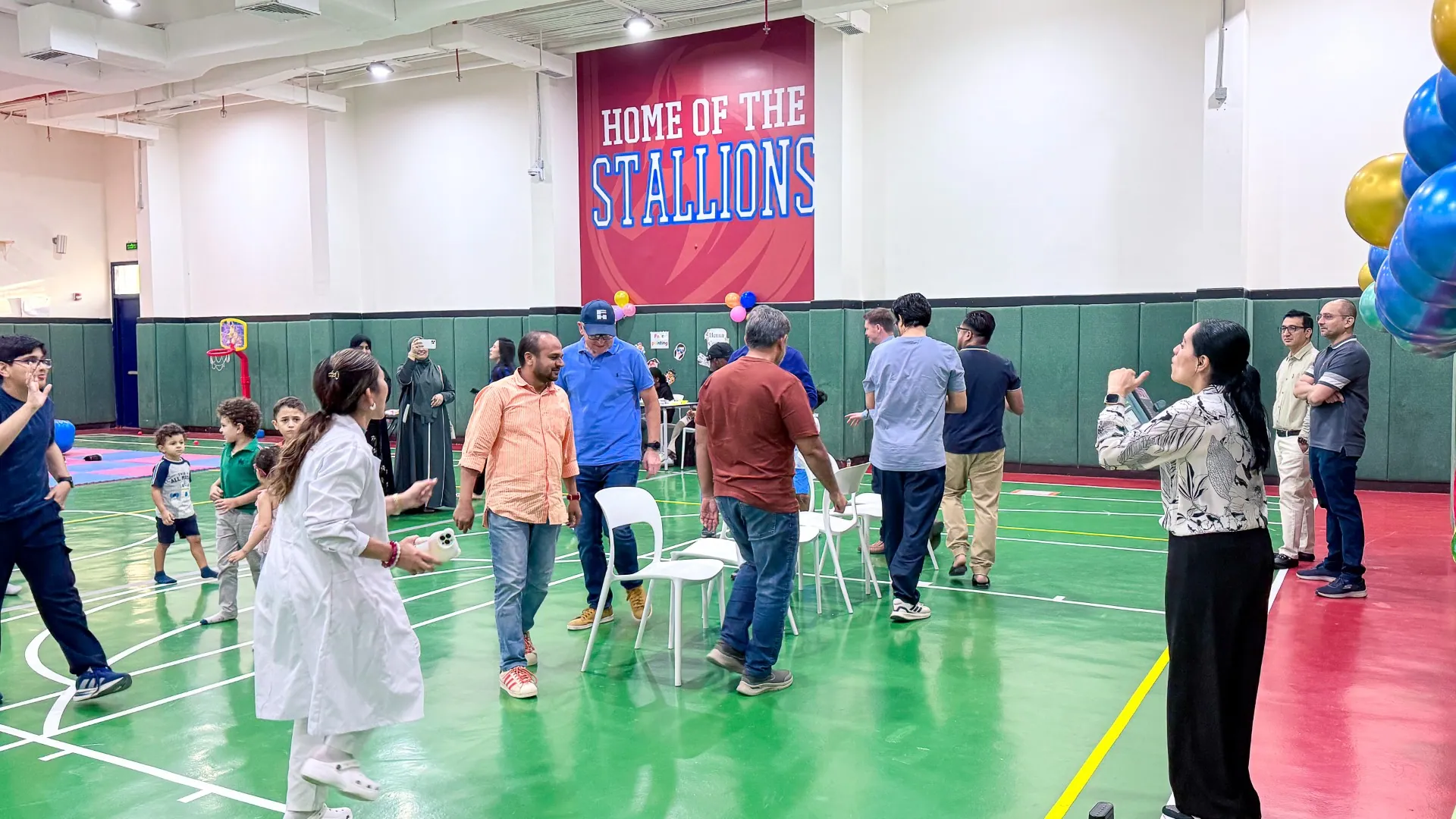 Parents and students gathered for a Home of the Stallions community event